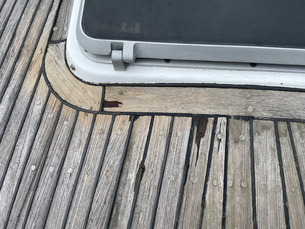 Teak deck with bad sealant