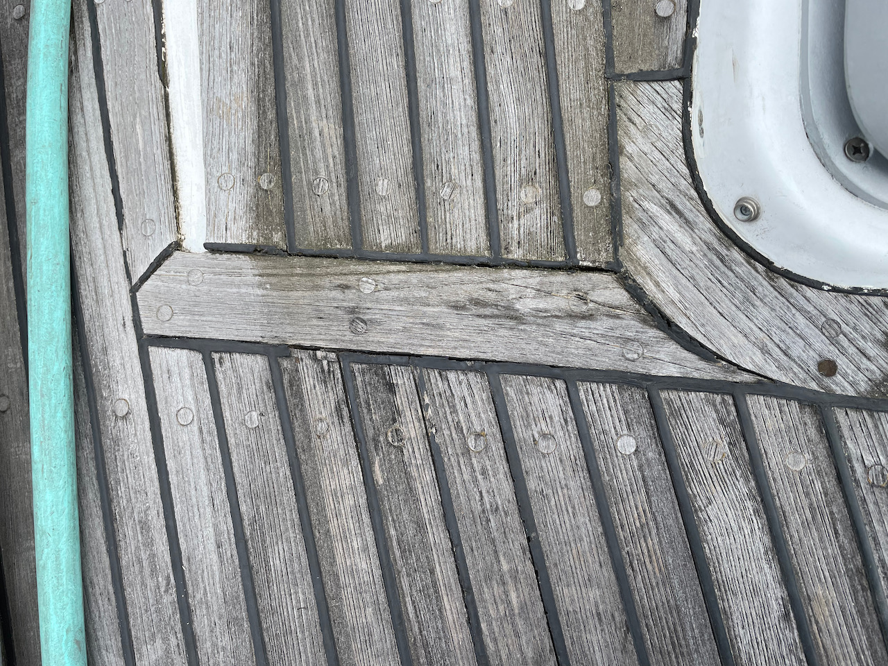 Teak deck with bad sealant