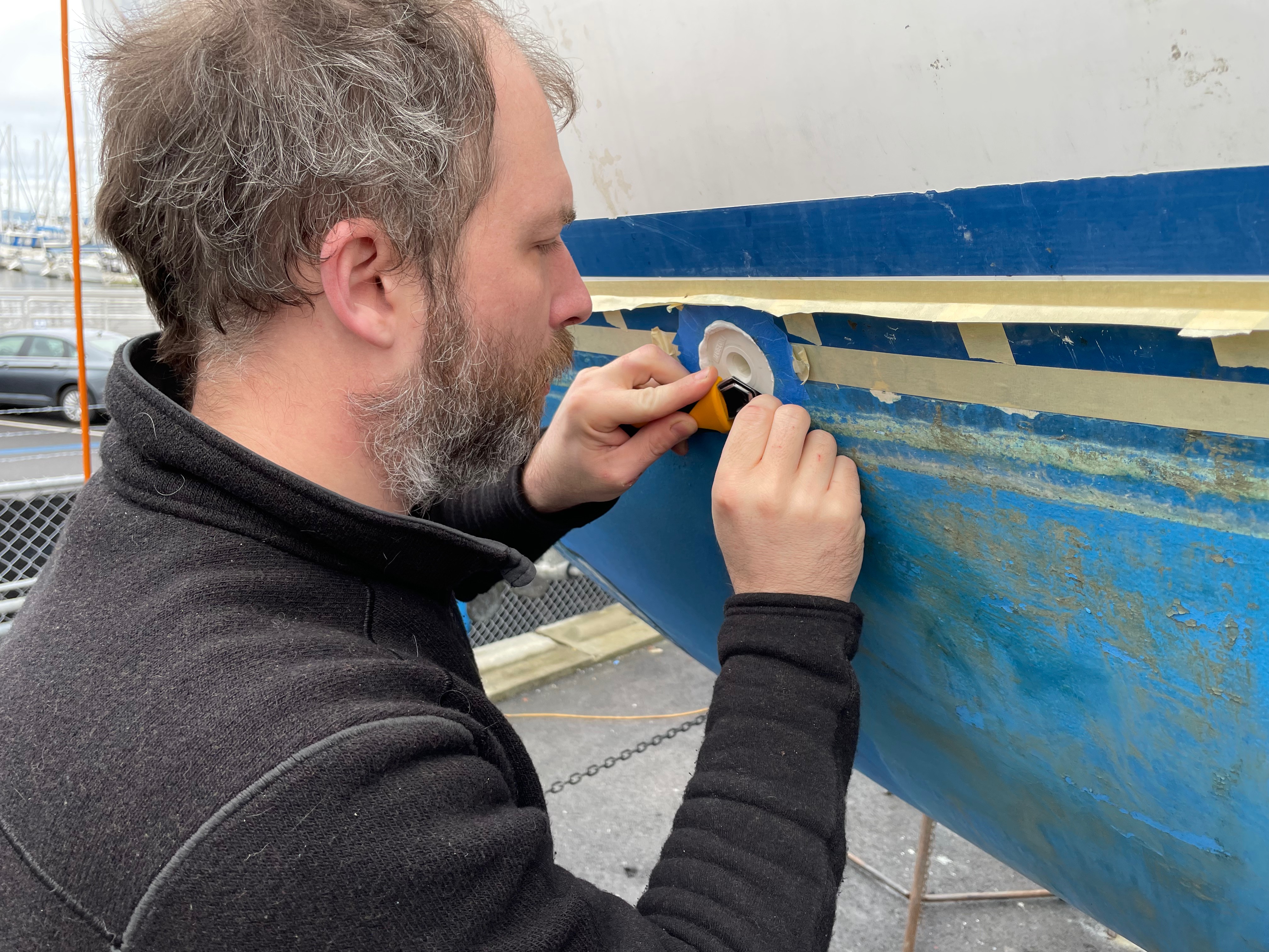 Shane working on the boat