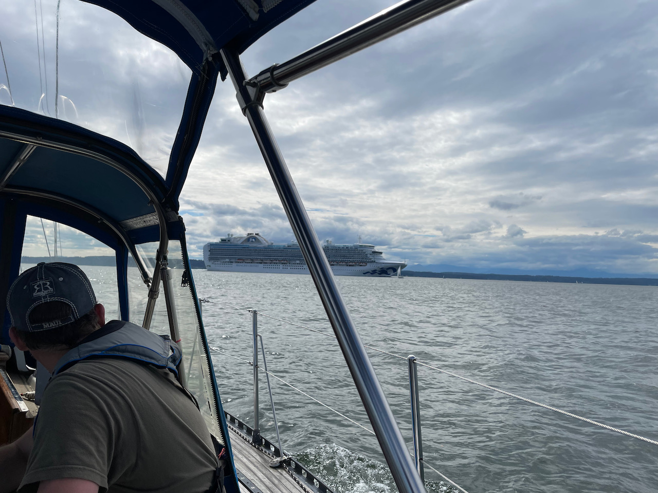 Shane watching a cruise ship go by